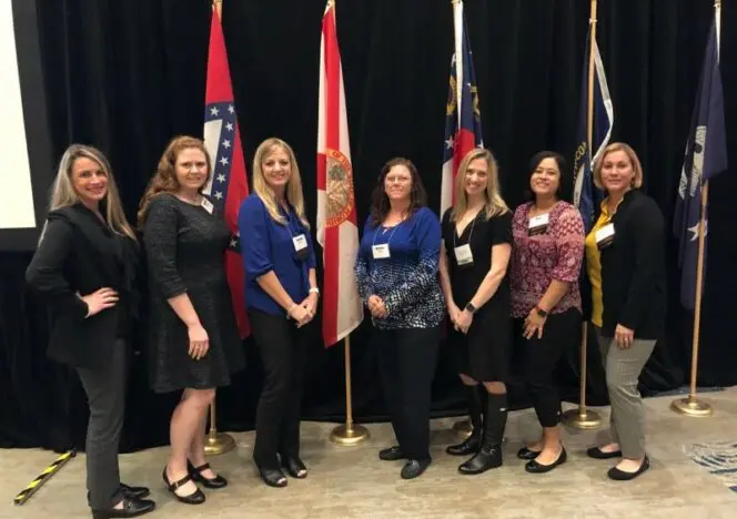 Student engaged in peaceful, individual work with a Montessori puzzle.