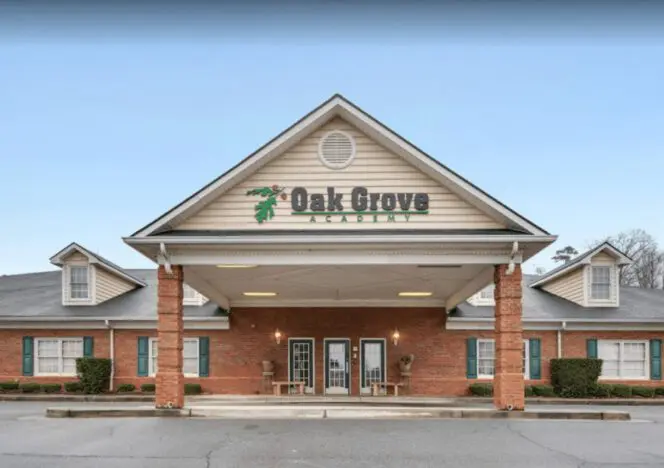 Classroom with Montessori learning materials organized on accessible shelves for student use.