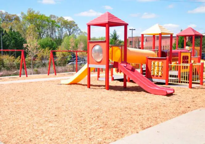 Calm, focused students working independently at a Montessori work table.