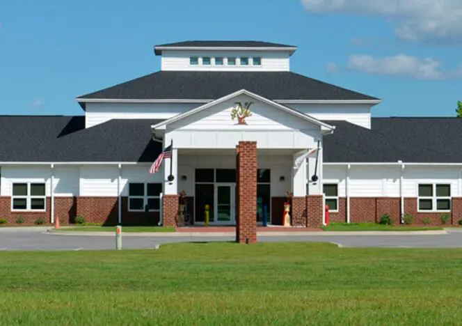 Child working with Montessori materials on a math lesson.