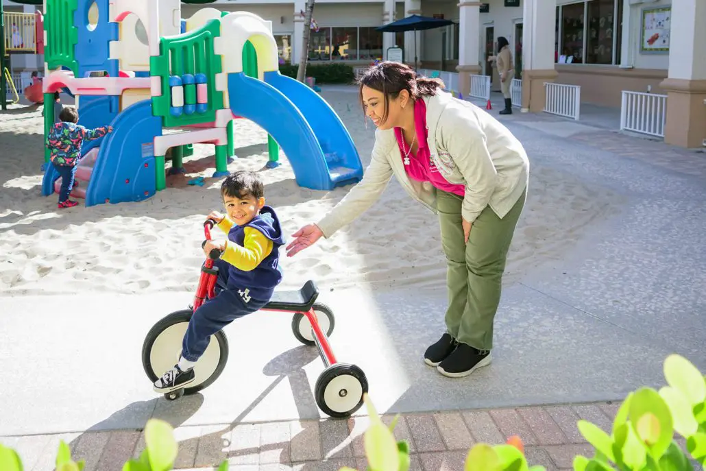 Students using Montessori bead chains to learn math concepts.