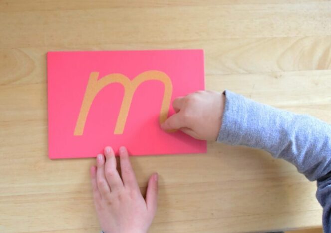 Children engaging in sensory activities using practical life materials.