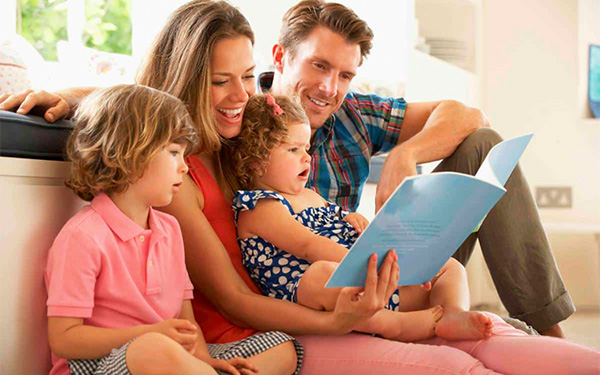 Parents-reading-with-children Parents reading with children